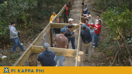 NSU Pi Kapps build boardwalk at George camp for people with disabilities