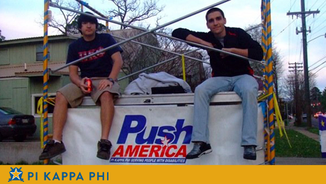 Pi Kapps raise awareness for Push America by sitting on scaffold