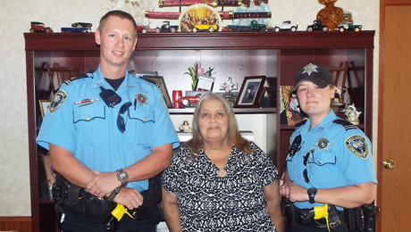 St. John Parish Sheriff's Office Lt. Jason Raborn, Judy Ferraro and Deputy Lisa Dorris. 